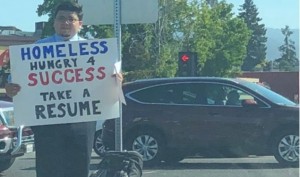 Homeless man flooded with job offers after he hands out resumes on road